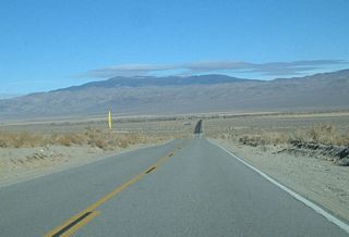 Shortly after cresting at Gilbert Summit, eastbound California 168 descends into Fish Lake Valley.