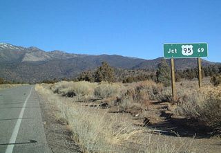 This mileage sign is posted on eastbound California 168 after the U.S. 395 junction in Big Pine. The mileage sign provides the distance to U.S. 95 in Nevada.