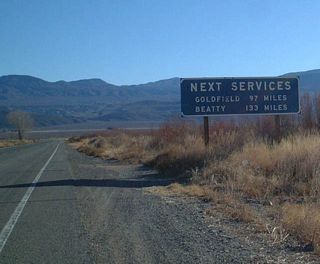 There are no services at all between Big Pine and Beatty and/or Goldfield. This includes not only Westgard Pass, but also Deep Springs Valley, Fishlake Valley, and Dyer, Nevada.