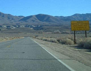 California 168 traverses several mountains and valleys, it can be windy and steep - hence why there's a sign warning motorists here.