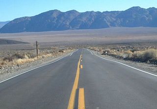Descending from Westgard Pass, eastbound California 168 enters isolated Deep Springs Valley.