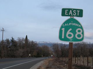 A California 168 east reassurance shield is posted prior to entering the urban areas of Bishop.