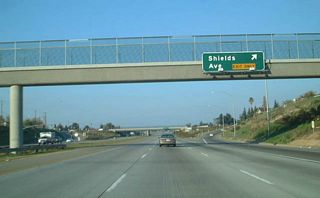 Eastbound California 168 (Sierra Freeway) reaches Exit 2, Shields Avenue.