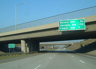 Still traveling northeast, California 168 (Sierra Freeway) approaches Exit 6, Bullard Avenue, three-quarters of a mile. This is the final exit to serve the city of Fresno; California 168 will soon enter the city of Clovis.