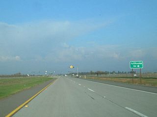 Eastbound California 168 (Sierra Freeway) approaches Tollhouse Road, one-quarter mile.