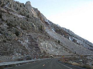 A large slide area appears on the left side of California 168 as the highway continues southwest into Lake Sabrina.