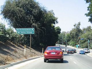 Now on the off-ramp to Exit 6, turn left to Valley Village and right to North Hollywood and the Red Line subway station.