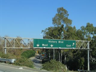 This view looks at the porcelain enamel signage found on the off-ramp to Exit 8B, Victory Boulevard.