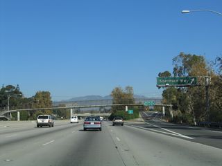 Northbound California 170 (Hollywood Freeway) reaches Exit 9, Sherman Way.