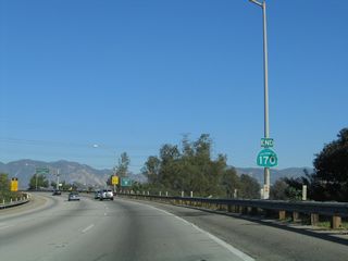An end shield for California 170 north is posted as the Hollywood Freeway transitions onto northbound Interstate 5 (Golden State Freeway).