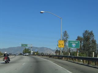 A roadside sign for the Interstate 5 sign is posted after the end shield; the ramp to Interstate 5 north is considered Exit 11B. There is no direct ramp to Interstate 5 south.