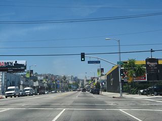 Northbound California 170 (Highland Avenue) meets Lexington Avenue at this traffic signal.