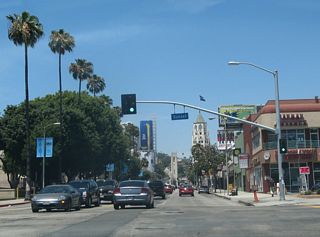 Northbound California 170 (Highland Avenue) meets Sunset Boulevard at this traffic signal.