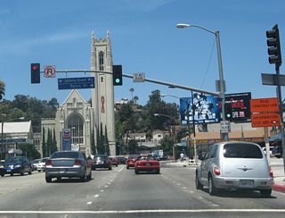 Northbound California 170 (Highland Avenue) meets Yucca Street at this traffic signal.