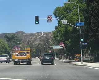 Northbound California 170 (Highland Avenue) meets Milner Road at this traffic signal.