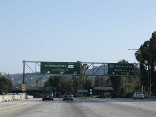 Immediately thereafter, southbound California 170 (Hollywood Freeway) splits: The right two lanes connect to Exit 5B, California 134 (Ventura Freeway) east, while the left three lanes (plus HOV lane) connect to Exit 5A, U.S. 101 (Hollywood Freeway) south. One could argue that California 170 "silently merges" with U.S. 101 between here and the Highland Avenue exit, but there is no signage to support that. Most do not know that California 170 continues south along Highland Avenue in Hollywood.