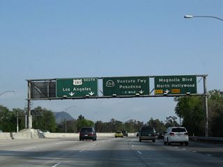 The right lane of California 170 (Hollywood Freeway) south becomes exit only for Exit 6B, Magnolia Boulevard. This overhead sign bridge omits Exit 6A, Riverside Drive but includes the last two exits along California 170 south: Exit 5B, California 134 (Ventura Freeway) east and Exit 5A, U.S. 101 (Hollywood Freeway) south to Hollywood and downtown Los Angeles.
