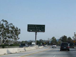 This mileage sign provides the distance to the next three exits from California 170 (Hollywood Freeway) south: Exit 8A, Oxnard Street and Laurel Canyon Boulevard; Exit 7, Burbank Boulevard; and Exit 6B, Magnolia Boulevard.