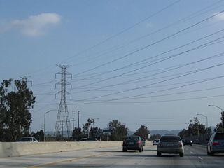 A set of Los Angeles Department of Water and Power (LADWP) power lines cross over the Hollywood near the on-ramp from Roscoe Boulevard.