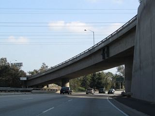Southbound California 170 crosses over the Tujunga Wash and passes under the ramp from Branford Street to Interstate 5 (Golden State Freeway) south.