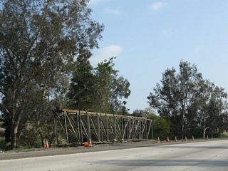 The overhead sign bridge previously in use along southbound Interstate 5 (Golden State Freeway) at the California 170 split was temporarily housed on the east side of the Hollywood Freeway.