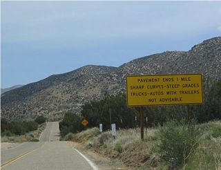 The paved section of eastbound California 173 ends only one mile east of Arrowhead Lake Road.