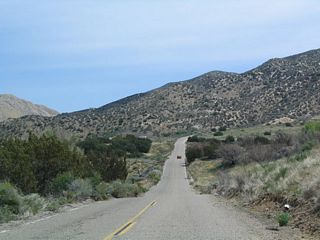 Eastbound California 173 as it approaches the dirt road segment east of Arrowhead Lake Road.