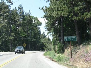 Westbound (northbound) California 173 meets the turnoff to Cottage Grove Road. This road provides local residential access adjacent to the state route.