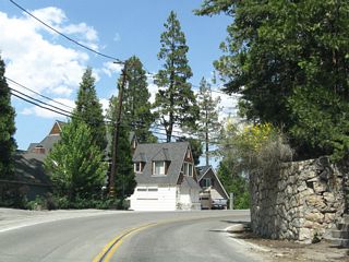 More sharp turns and driveways line California 173 north of the main village entrance, so motorists should use caution while driving through here.