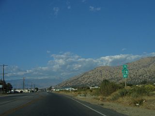 This California 178 trailblazer is posted on eastbound Lake Isabella Boulevard prior to the intersection with Norris Road. Turn left here to the Norris Road interchange.