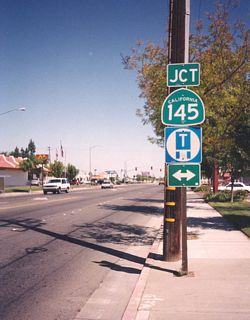 SR 180 follows Whitesbridge Avenue across the north side of Kerman to SR 145 (Madera Avenue). Photo taken by Trevor Carrier (2002).
