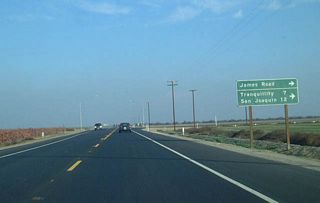 Prior to entering Kerman, eastbound California 180 approaches James Road.