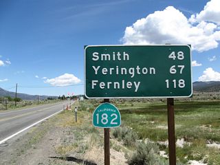 Upon leaving the U.S. 395 intersection, northbound California 182 begins with a mileage sign that provides the distance to three destinations in Nevada: Smith (48 miles), Yerington (Alternate U.S. 95, 67 miles), and Fernley (Interstate 80, 118 miles via Alternate U.S. 95 north). California 182 will follow the East Walker River to Devils Gate, where the highway leaves California and enters Nevada.