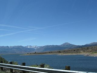 Bridgeport Reservoir emerges on the southwest side of California 182. A dam at the north end of the lake holds back the East Walker River to form this reservoir.