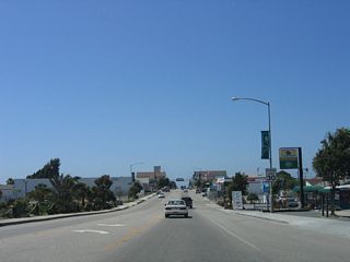 South of downtown Castroville, California 183 is three lanes wide, with a center left turn lane, as the state highway follows Merritt Street northwest.