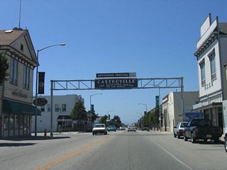 Northbound California 183 (Merritt Street) enters downtown Castroville, the "Artichoke Center of the World." home to 6,724 people as of the 2000 Census, artichokes are produced in vast quantity in the Pajaro Valley along the coastal plain. An annual artichoke festival is held in Castroville. This arch is located near the Preston Street intersection.