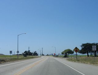Northbound California 183 (Merritt Street) approaches California 1 (Cabrillo Highway). No end shield is present.