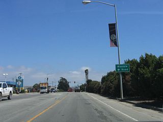 The next traffic signal connects California 156 with Blackie Road, which parallels California 156 and travels east to U.S. 101 (El Camino Real) south of the California 156 Prunedale interchange.