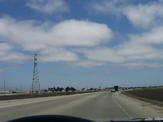 A 138 kV power line crosses over California 183. In the distance, the city of Salinas (seat of Monterey County) comes into view.