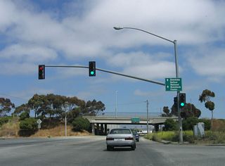 Southbound California 183 (Castroville Road) approaches the interchange with Davis Road. Continue straight ahead to follow California 183 (Market Street) south into downtown Salinas. Turn right here to follow South Davis Road south to the western outskirts of Salinas and Reservation Road.