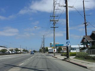 After the Davis Road interchange, California 183 ceases to be a truck route. From here, the state highway follows the railroad into downtown Salinas.