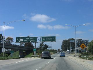 The left lane departs to U.S. 101 north, while the right two lanes continue north on Main Street. Main Street continues north past Sherwood Park and Northridge Mall before reuniting with U.S. 101 at the Espinosa Road/Russell Road intersection north of the Boronda Road interchange.