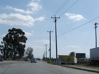 This mileage sign along California 184 south provides the distance to Lamont (five miles), Arvin (14 miles), and Interstate 5 near Wheeler Ridge (26 miles).