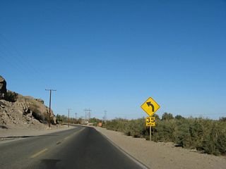 California 186 turns a bit to the northwest as it approaches the Rockwood diversion gate.