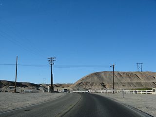 A California historic marker is located at the Rockwood Gate, alongside a wide spot on the road that allows for parking (although on some sand).