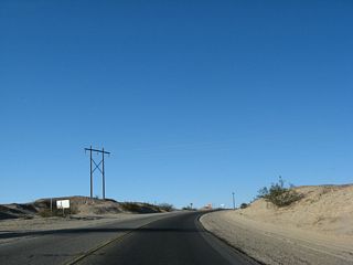 Leaving the All American Canal behind, California 186 approaches Interstate 8 after crossing this hill.