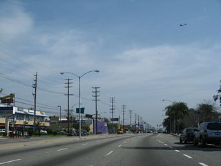 Los Angeles Department of Water and Power transmission lines follow California 187 (Venice Boulevard) as we head northeast to our junction with Interstate 10.