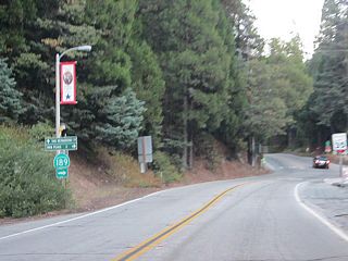 Leaving Blue Jay, SR 189 turns southwest and then south into Agua Fria. There SR 189 makes a nearly 180 degree turn while intersecting Daley Canyon Road. Daley Canyon Road provides a cut off south to SR 18.