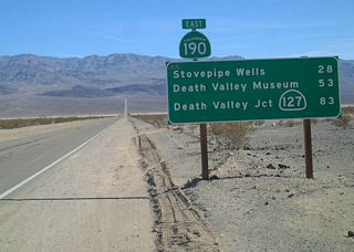 After Panamint Valley Road is this mileage sign, which provides the distance to Stovepipe Wells, which is the location of the next motorist services. The sign also provides distances to Death Valley Junction and California 127. California 190 is the main route into Death Valley National Park from the west.