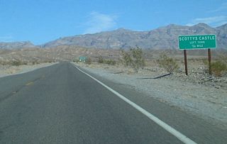 Eastbound California 190 approaches the turnoff to Scottys Castle, a large estate constructed in the middle of the desert that is part of Death Valley National Park.
